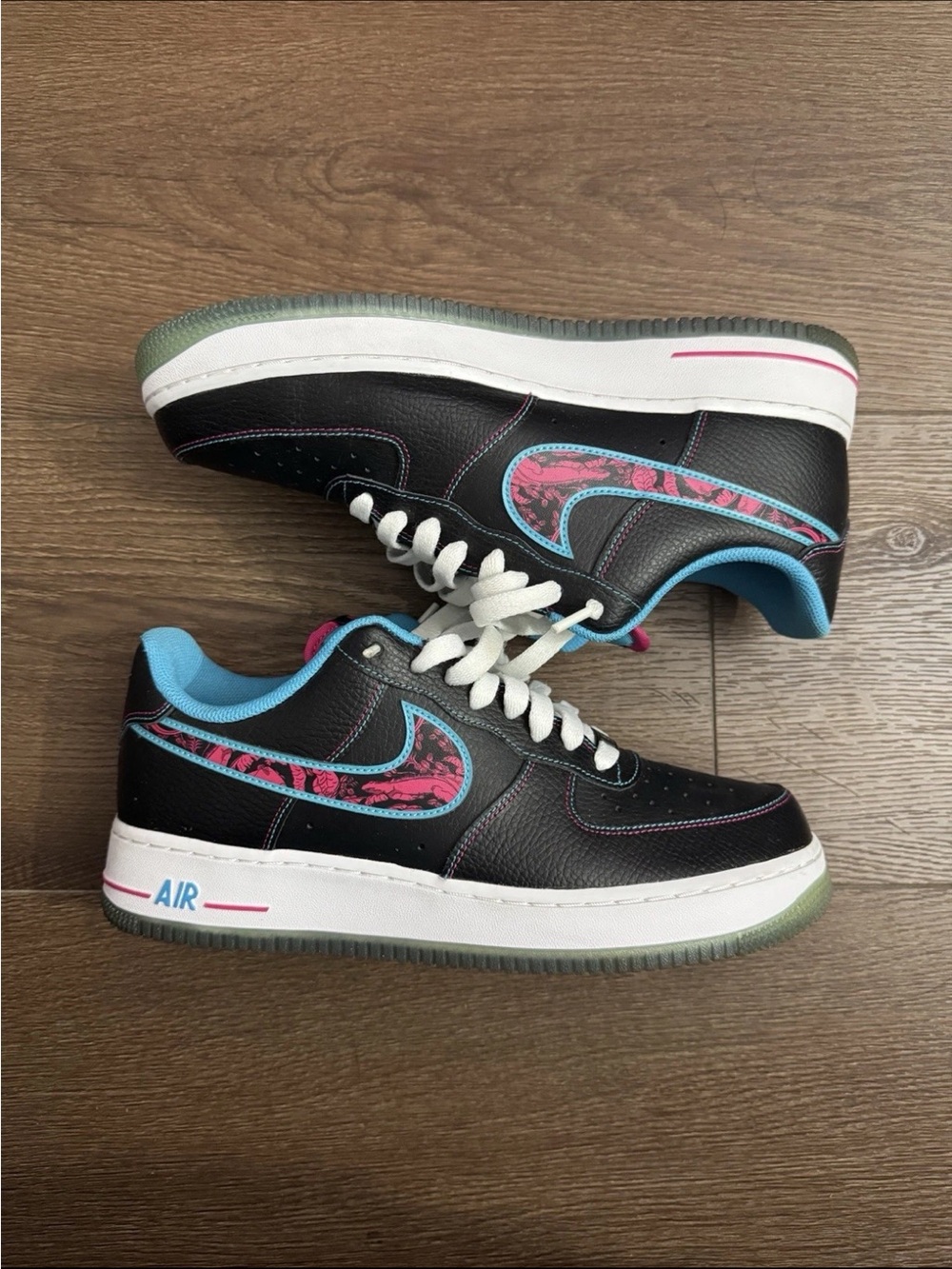 Nike Black Low-Top Sneakers with Pink & Blue Accents